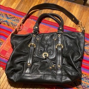 B. Makowsky purse in black leather